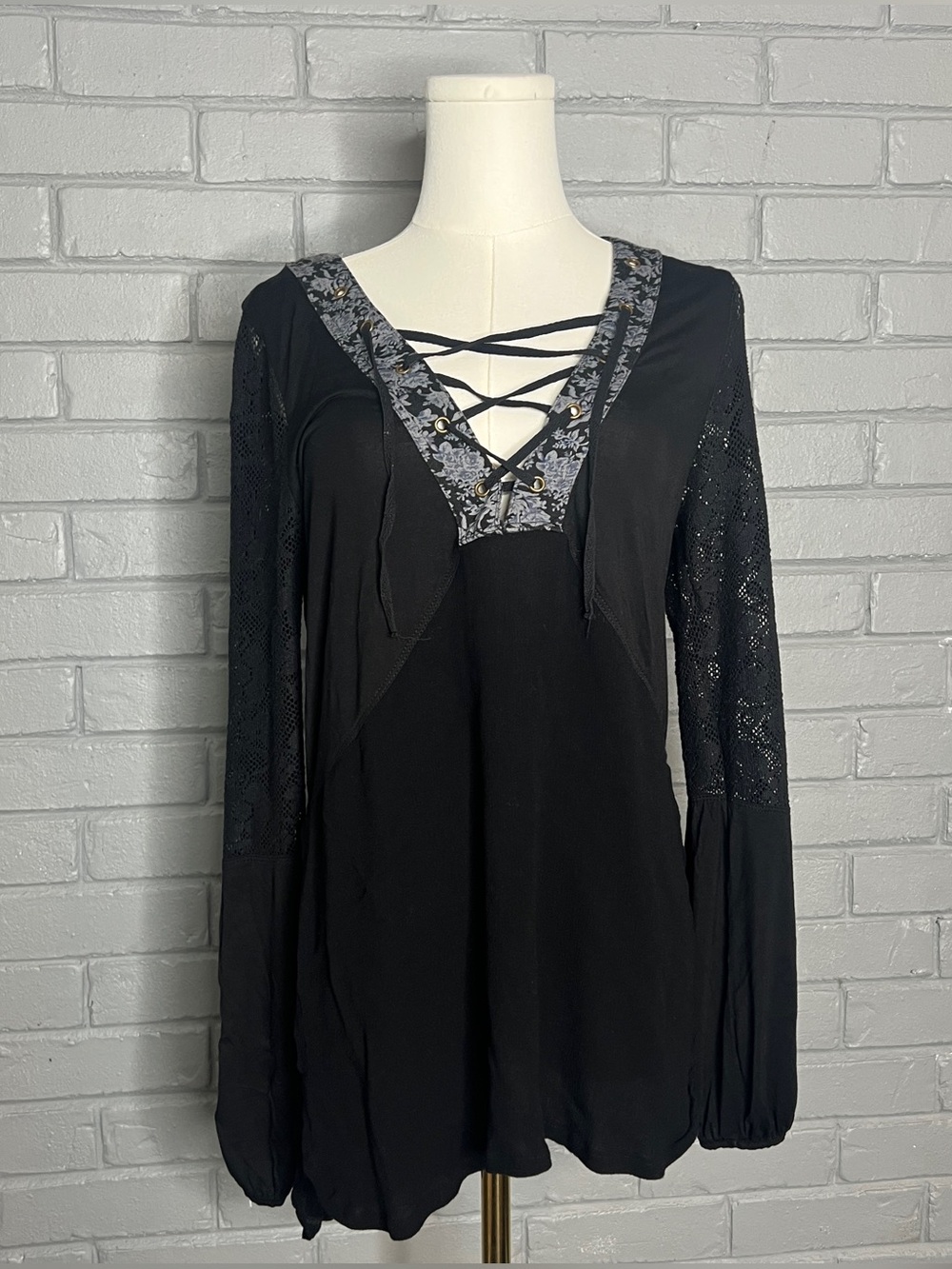 gimmicks by BKE Black Long-Sleeve Lace-Trim Crisscross V-Neck Tunic Blouse